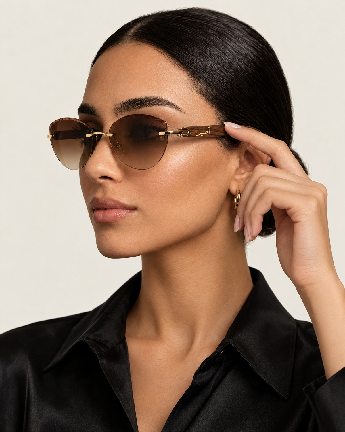 Woman in profile wearing Rawan sunglasses