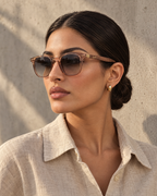 Woman wearing Zayd sunglasses outdoors